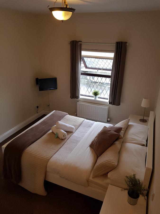 The Coach House Roundwood Quarto foto